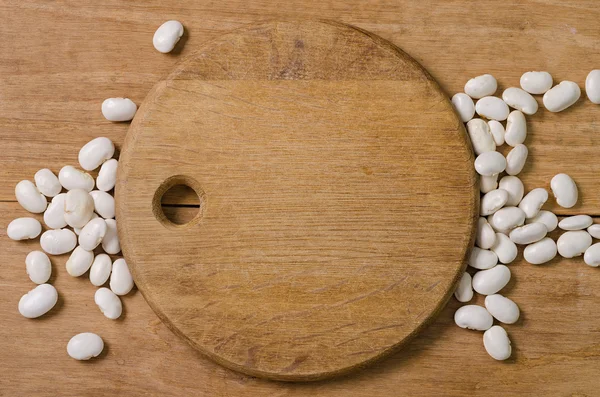 Frijoles en tazón en la mesa — Foto de Stock