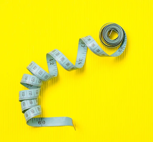 Twisted tape measure — Stock Photo, Image