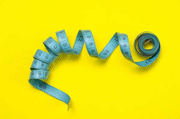 Twisted tape measure — Stock Photo, Image