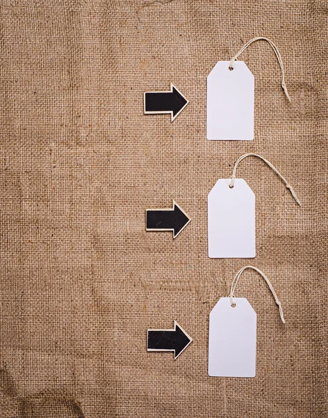 Wood derection arrows with tags — Stock Photo, Image