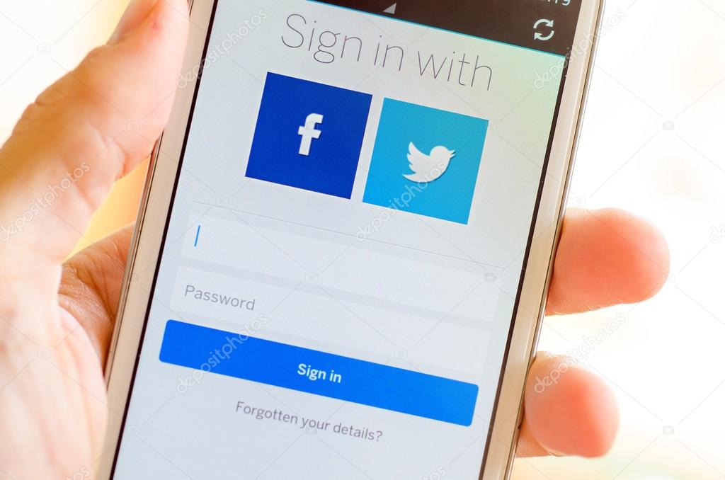 LVIV, UKRAINE - May 19, 2015: hand holding white Samsung Galaxy Smart Phone with MySpace social network Log In Screen with Facebok and Twitter icon