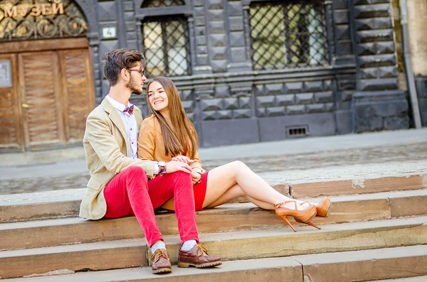 Young couple posing on streets