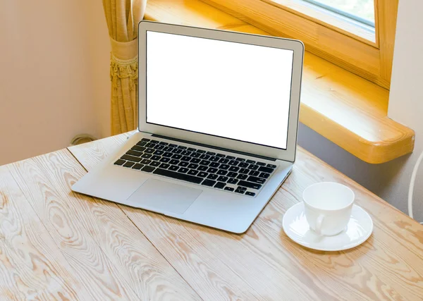 Modern laptop on wood desk — Stock Photo, Image