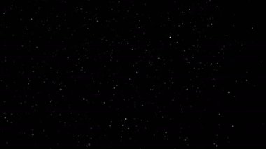 Atmosferik toz parçacıkları siyah arkaplanda izole edildi. Görüntüyü ekran üzerine yerleştir veya ekleme kipi ekle.