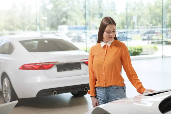 Young Female Customer Examining Cars Sale Dealership Salon Copy Space Stock Image