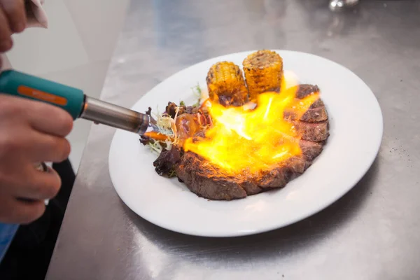 Close Delicious Beef Steak Flames Blowtorch Professional Chef Using — Stock Photo, Image