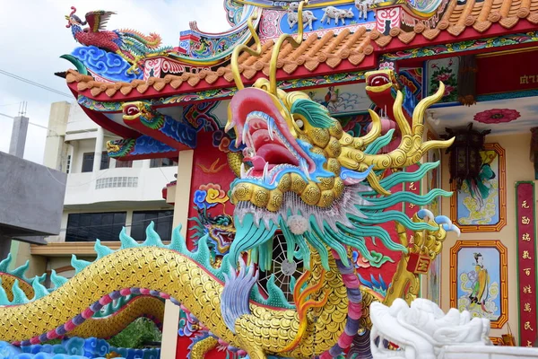 Chinese art shrine in Thailand. It is the worship of people in Chonburi, Thailand. Chinese sculpture Made of stone decorated inside the shrine area. Chinese dragon statue Chinese decoration According