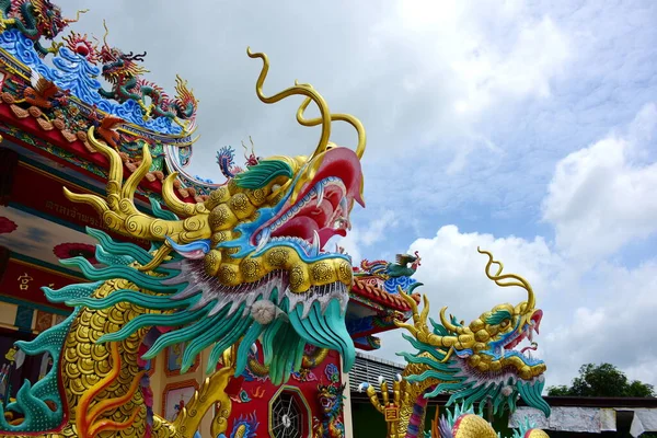 Chinese art shrine in Thailand. It is the worship of people in Chonburi, Thailand. Chinese sculpture Made of stone decorated inside the shrine area. Chinese dragon statue Chinese decoration According