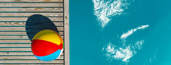 Beach Ball Sunny Day Wooden Decking Next Tranquil Pool Render — Stockfoto