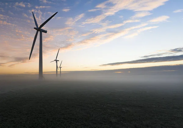Three Commercial Wind Turbines Thick Fog Sunrise English Countryside — Stock Photo, Image