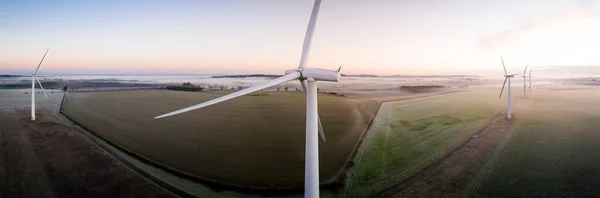 Aerial View Three Wind Turbines Early Morning Fog Sunrise English —  Fotos de Stock