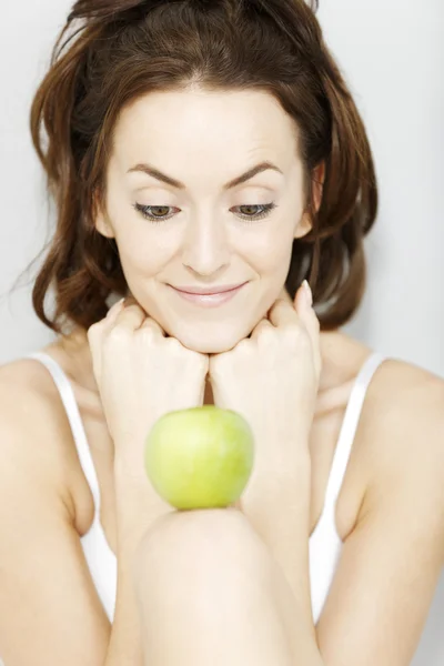 Woman with fresh apple — Stock Photo, Image