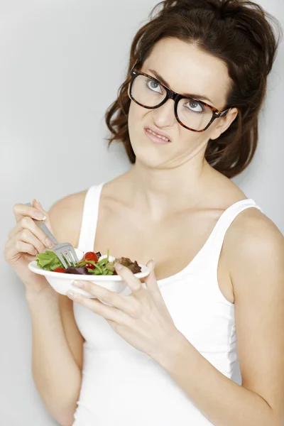 Woman eating fresh salad — Stock Photo, Image