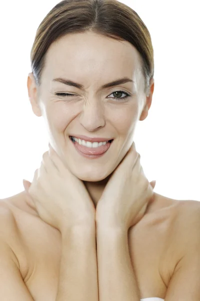 Mujer guiñando un ojo con la lengua — Foto de Stock