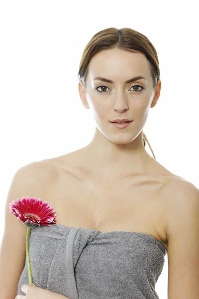 Woman holding red flower — Stock Photo, Image