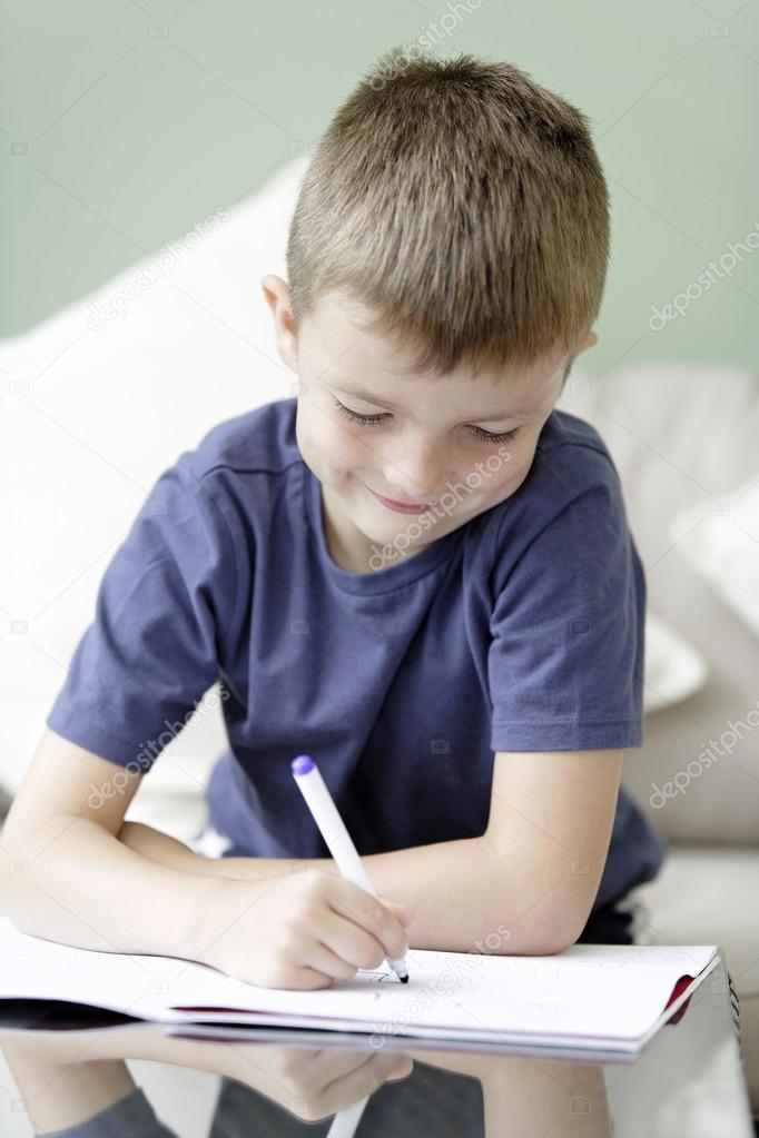 Young boy doing homework