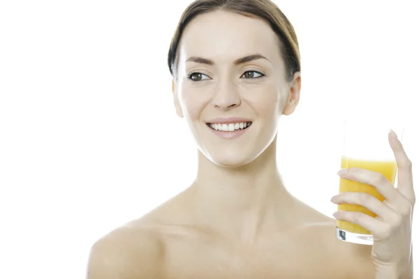 Woman holding a glass of Orange juice — Stock Photo, Image