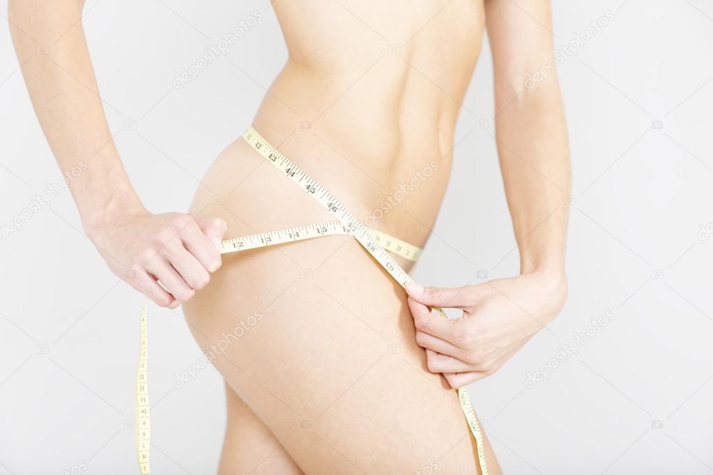 woman using measuring tape
