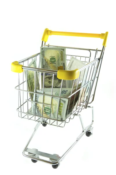 Trolley with dollars on white background — Stock Photo, Image