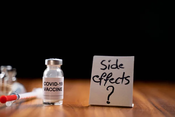 Concept Coronavirus Covid Vaccination Side Effects Doubts Questions Showing Vaccine — Stock Photo, Image