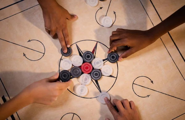 Top View Multiethnic Kids Hands Arranging Carrom Board Game Coins — Stock Photo, Image