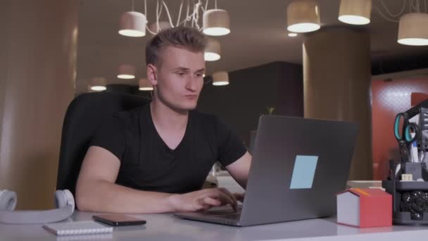 Young Business Man Sits Table Laptop Working Home Office Gets — Stock Video
