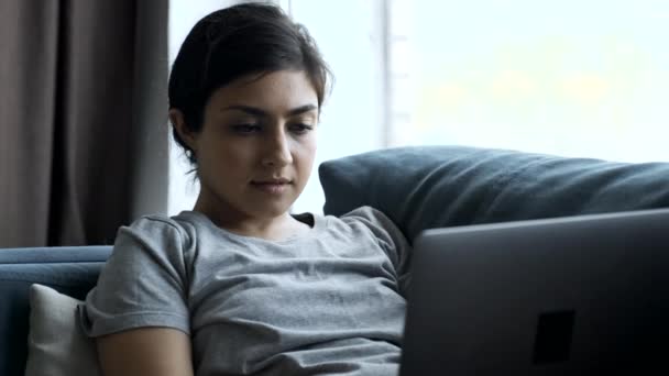 Young Woman Home Sitting Couch Works Laptop Computer Girl Using — Stockvideo