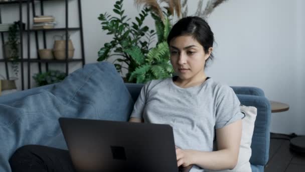 Young Indian Woman Home Sitting Couch Works Laptop Computer Girl — 图库视频影像