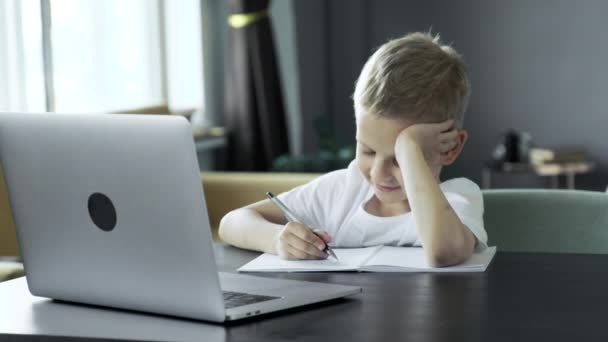 Child Does Homework Uses Computer Engaged Training Sits Table Bright — Stock Video