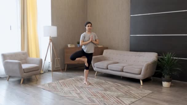 Young Indian Woman Meditates Morning Bright Room Home Standing One — Stock Video