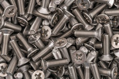 Stainless steel phillips flat head screws. Macro photo high resolution close up photo clipart
