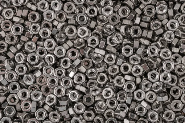 Paslanmaz çelik fındıklı arka plan makro fotoğrafı. Yüksek çözünürlüklü yakın plan fotoğraf