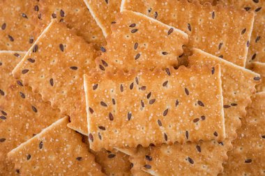 Kurabiye arka planı. Şekerli ve keten tohumlu bisküviler..