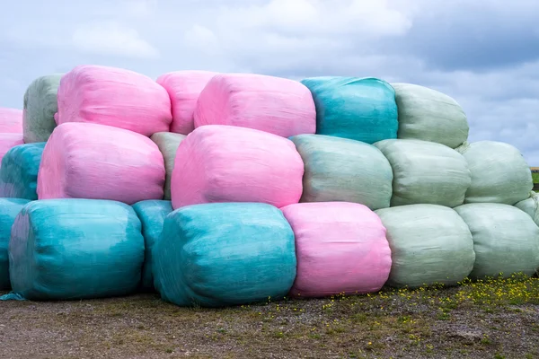 Stack of multicoloured silage bags — Stock Photo, Image