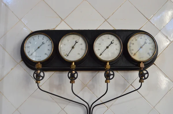 Four gauges in a panel — Stock Photo, Image