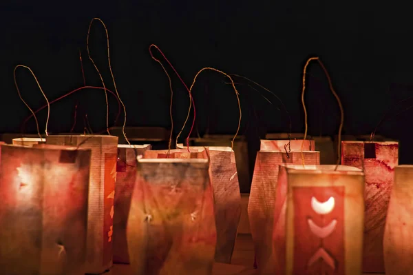 Christmas Eve lanterns on the ground — Stock Photo, Image