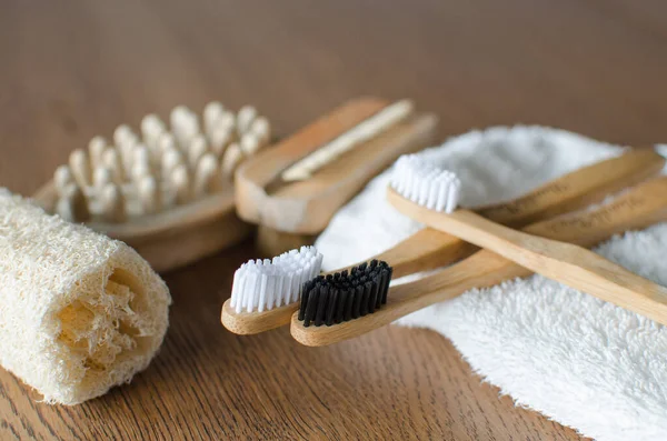 Three Bamboo Toothbrushes Towel Eco Natural Plastic Fre — Stock Photo, Image
