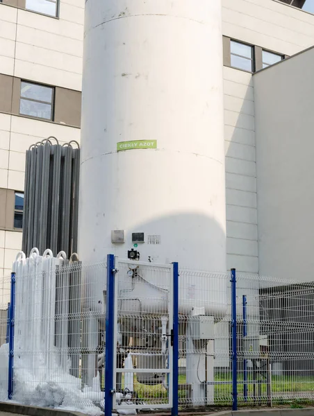 Outside liquid nitrogen tank. liquid nitrogen flows out and turn into ice