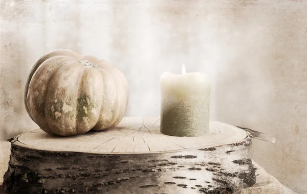 Artwork  in painting  style,  small pumpkin and burning candle — Stock Photo, Image