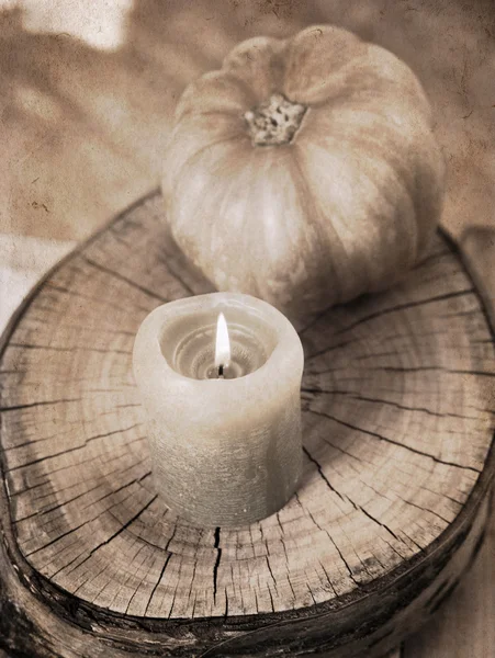 Artwork  in painting  style,  small pumpkin and burning candle — Stock Photo, Image