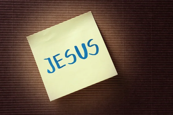 Texto de Jesús en nota adhesiva amarilla — Foto de Stock