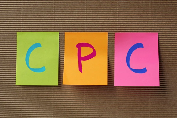 カラフルな付箋の Cpc (クリック当たりの費用) の頭字語 — ストック写真