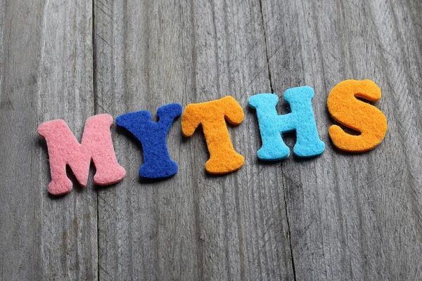 Myths text on wooden background — Stock Photo, Image