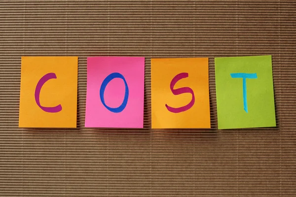 Cost text on colorful sticky notes — Stock Photo, Image