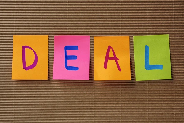 Deal text on colorful sticky notes — Stock Photo, Image