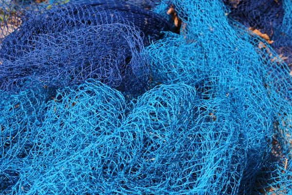 Blue fishing net background — Stock Photo, Image