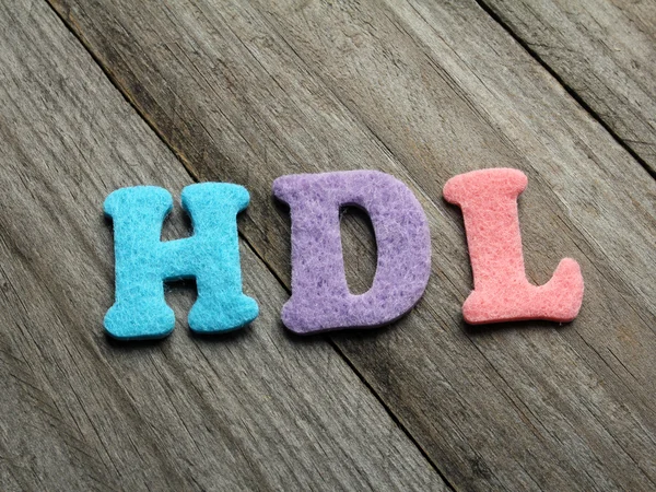 HDL (High-density lipoprotein) afkorting op houten achtergrond — Stockfoto