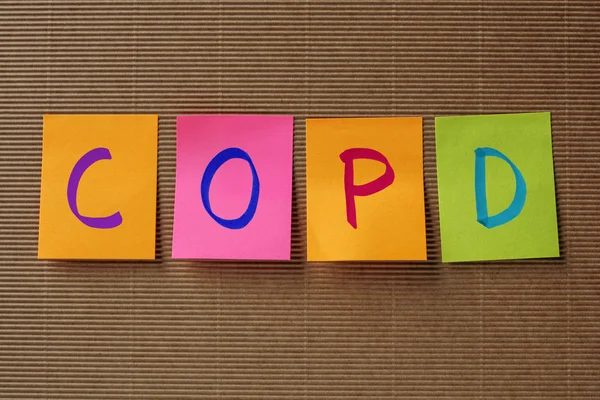 DPOC (Doença Pulmonar Obstrutiva Crônica) acrônimo em notas adesivas coloridas — Fotografia de Stock