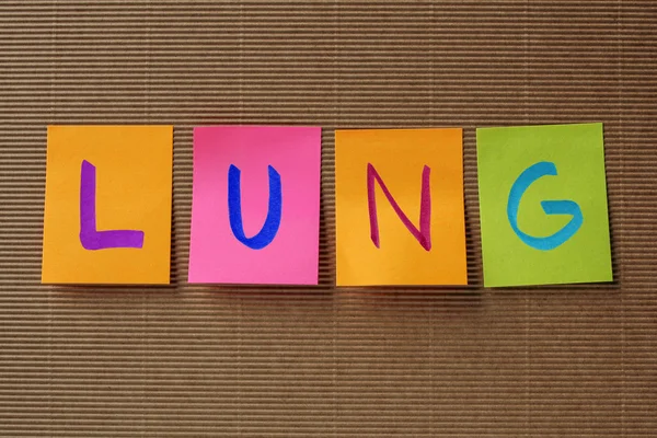 Texto pulmonar en notas pegajosas coloridas —  Fotos de Stock