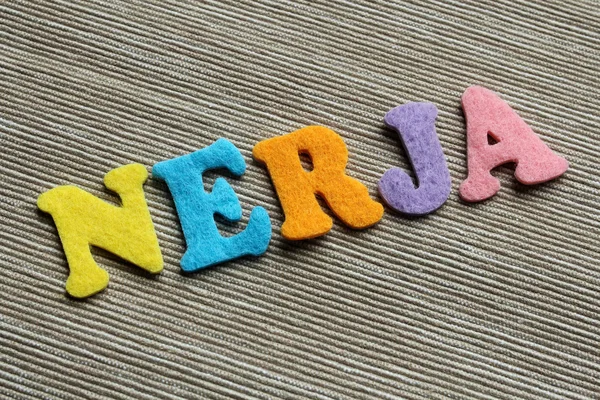 Palavra Nerja feita com letras coloridas de feltro — Fotografia de Stock